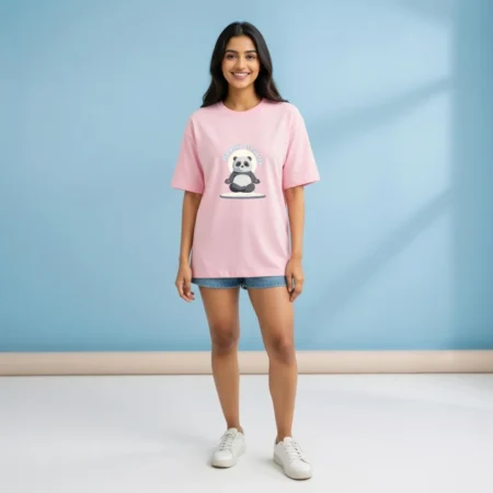Female model wearing Zen Panda Unisex oversized tshirt pink coloured